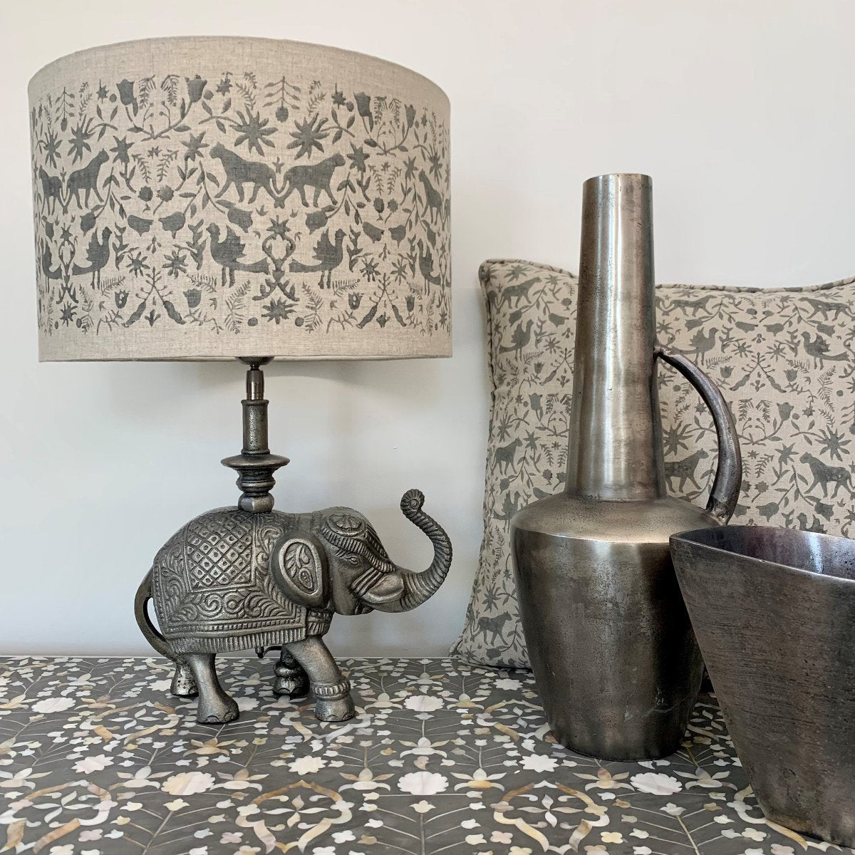 block printed cotton lamp shades and cushions. antique metal lamp bases and decorative pieces 